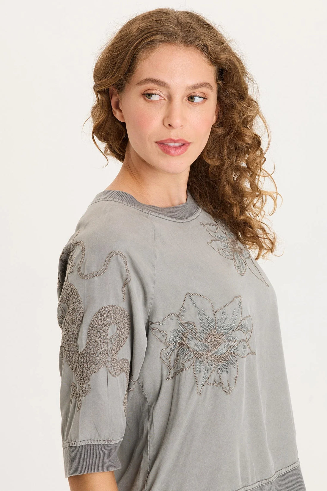 Snap-Back Embroidered Top