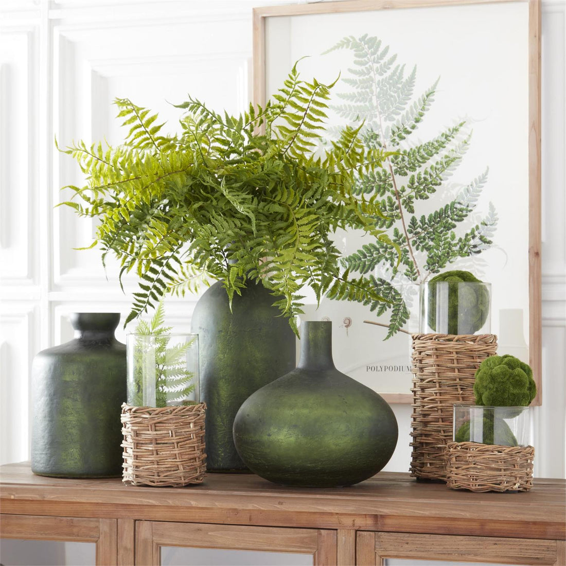 Clear Glass Cylinders in Woven Rattan Baskets