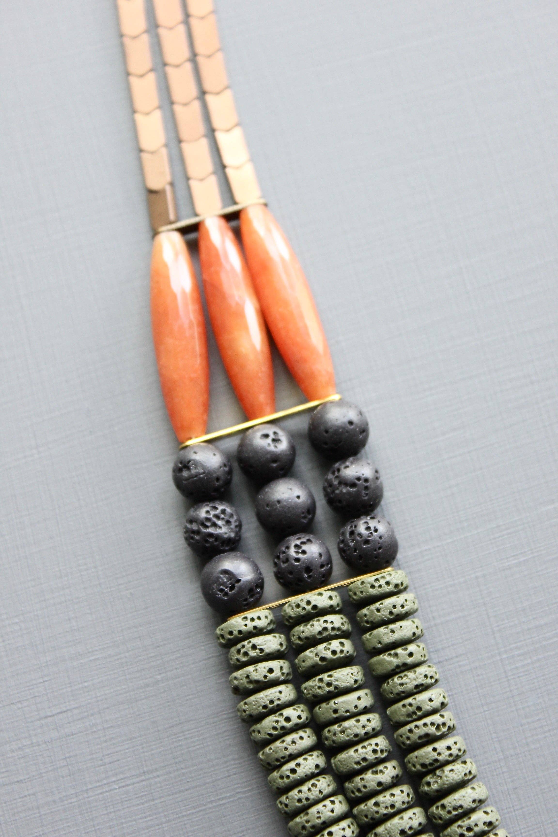 LEX221 Triple strand moss, jet, and carnelian necklace