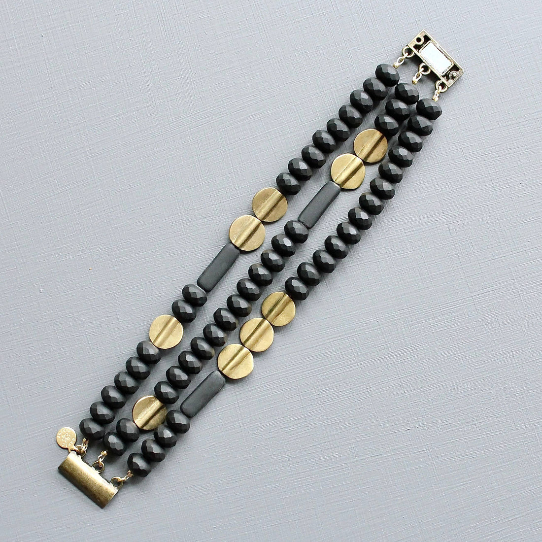 Black and Brass Triple Strand Bracelet
