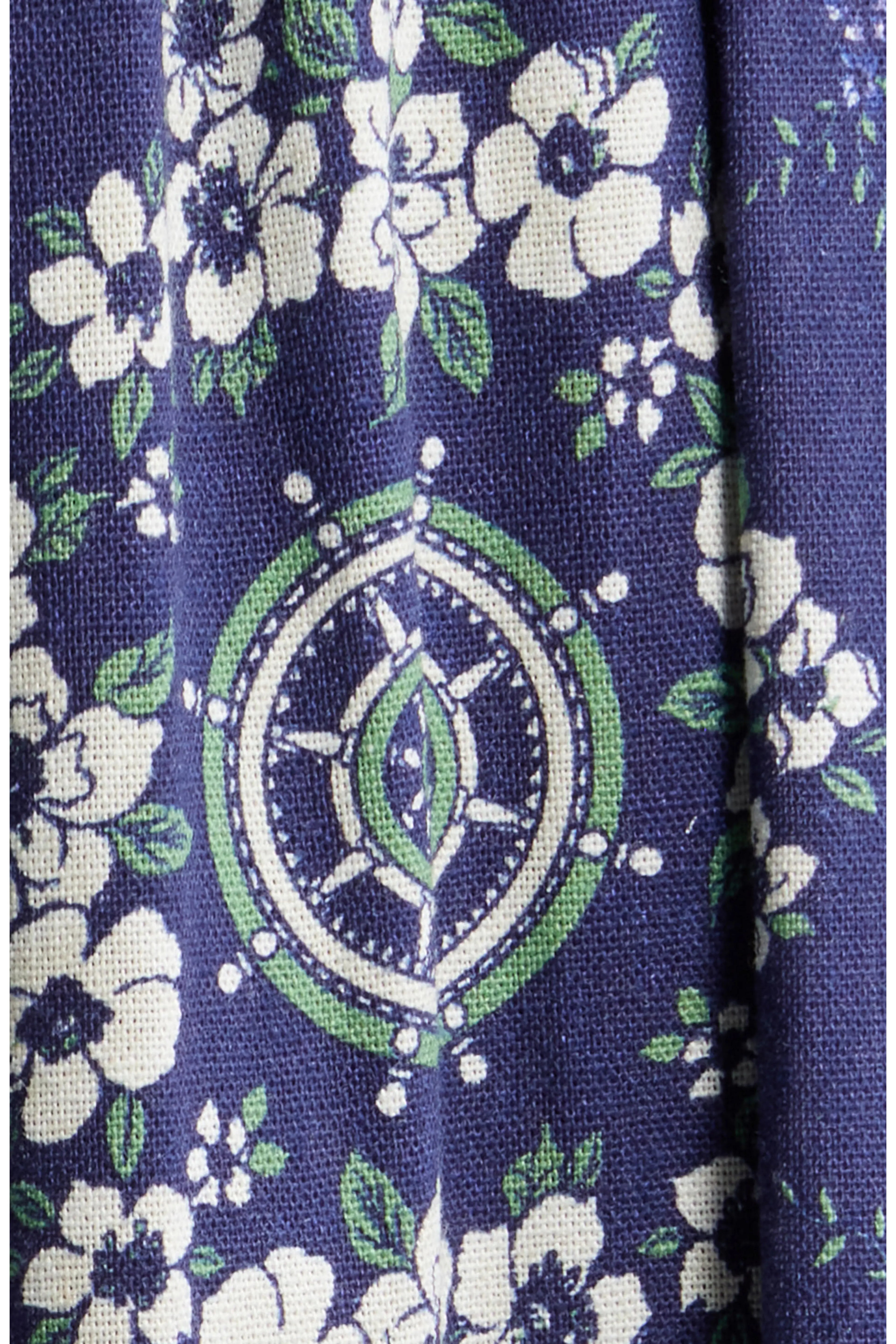 Close up of navy blue bandana-patterned cotton-linen fabric.