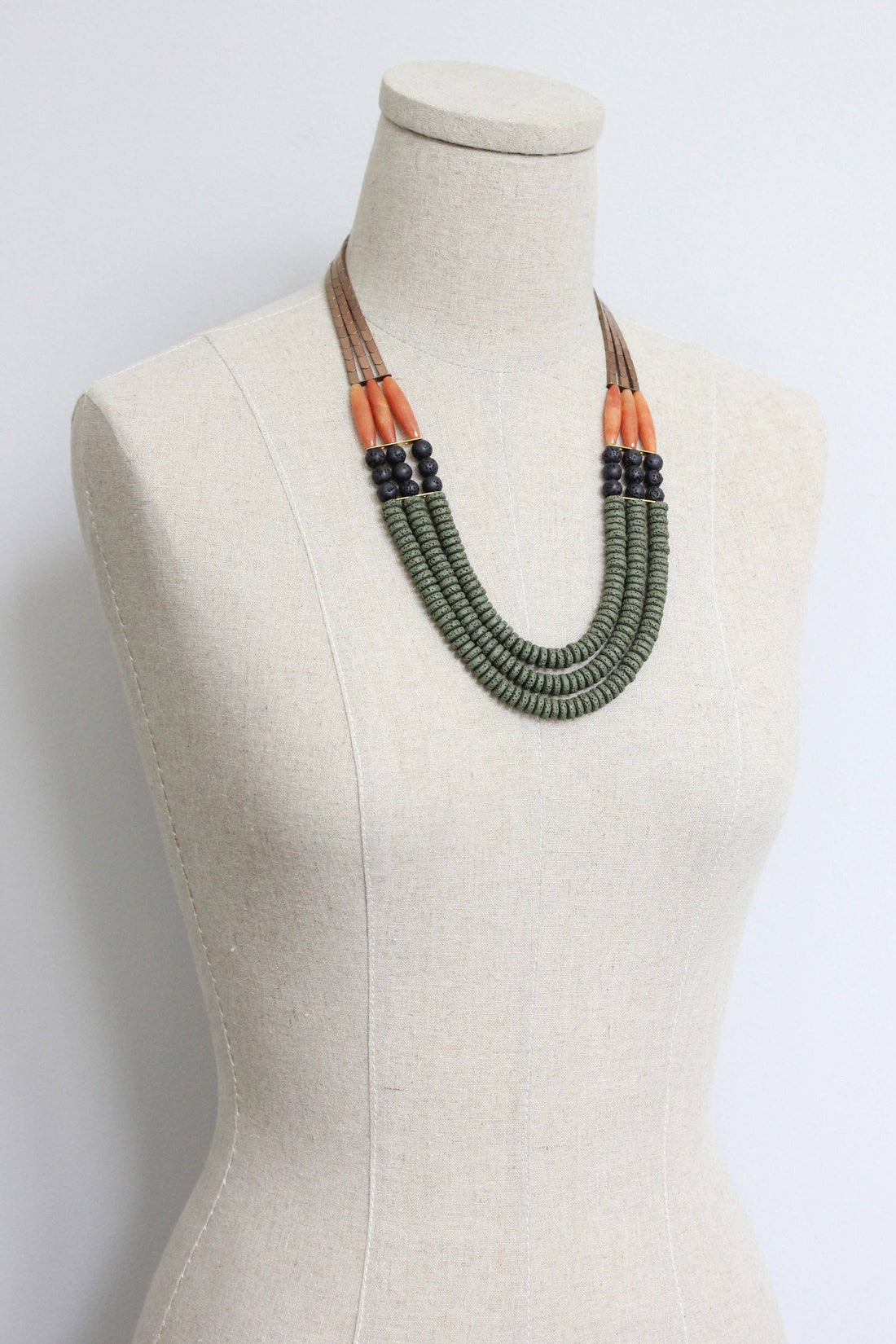 LEX221 Triple strand moss, jet, and carnelian necklace