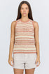 Front view of a woman wearing a sleeveless crew-neck sweater tank with terra-cotta and ivory horizontal stripes, paired with light linen shorts.